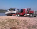 Not only do we offer light, medium and heavy duty towing we can even haul boats!